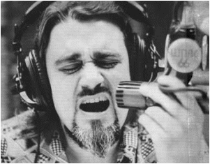 Click to hear Wolfman Jack